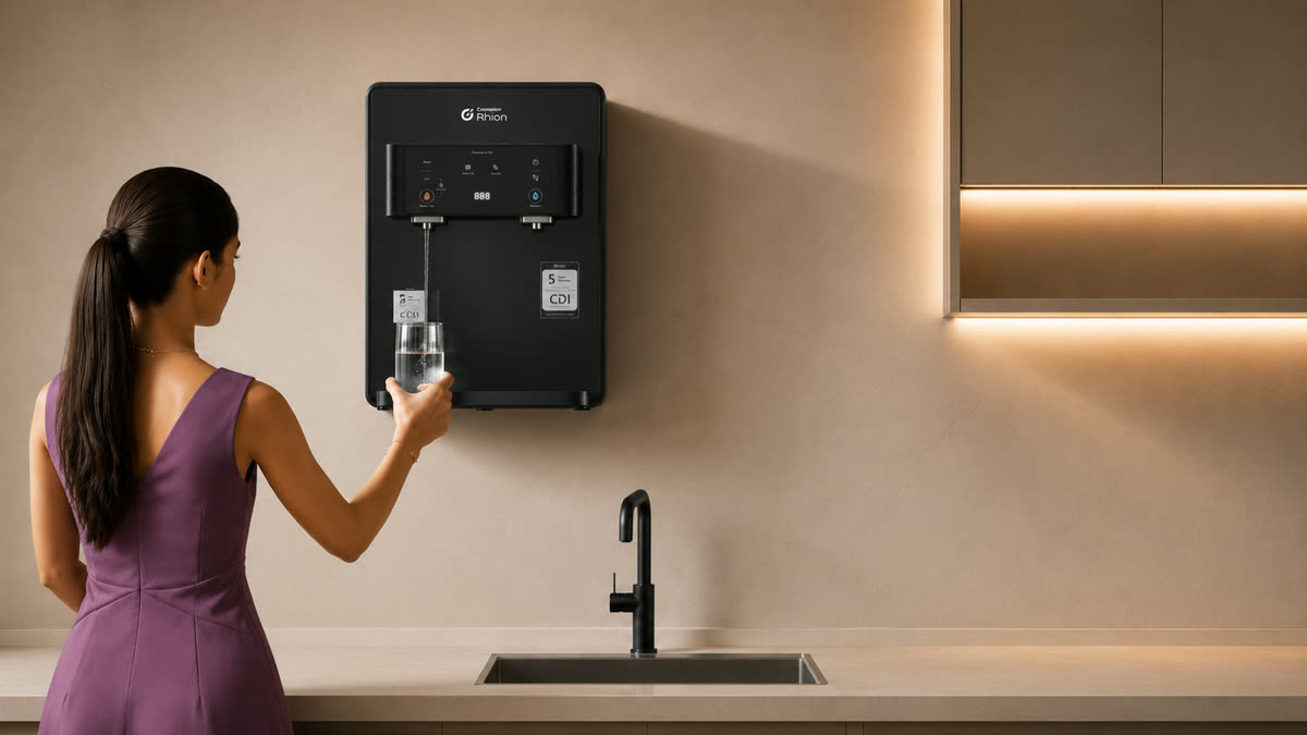 Person using a Rhion Biofier in a kitchen